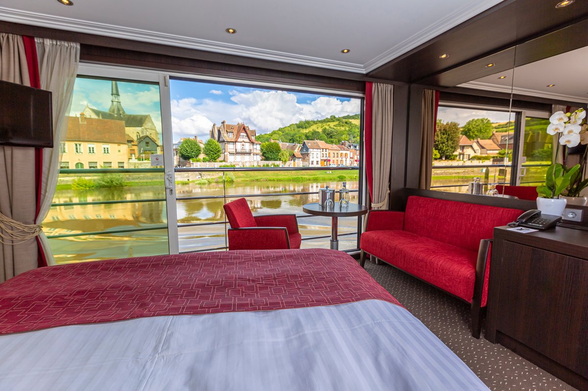 Avalon Waterways Suite Ship passing dramatic river castles along the Rhine River